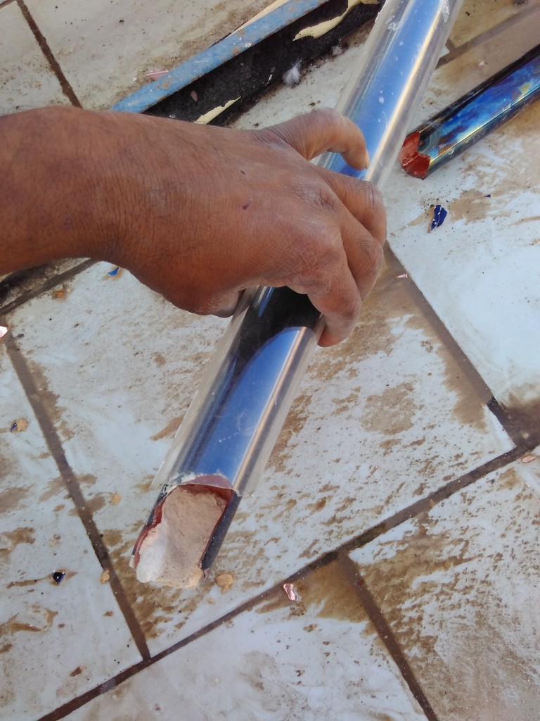 Scale formation in Evucuated solar glass tubes